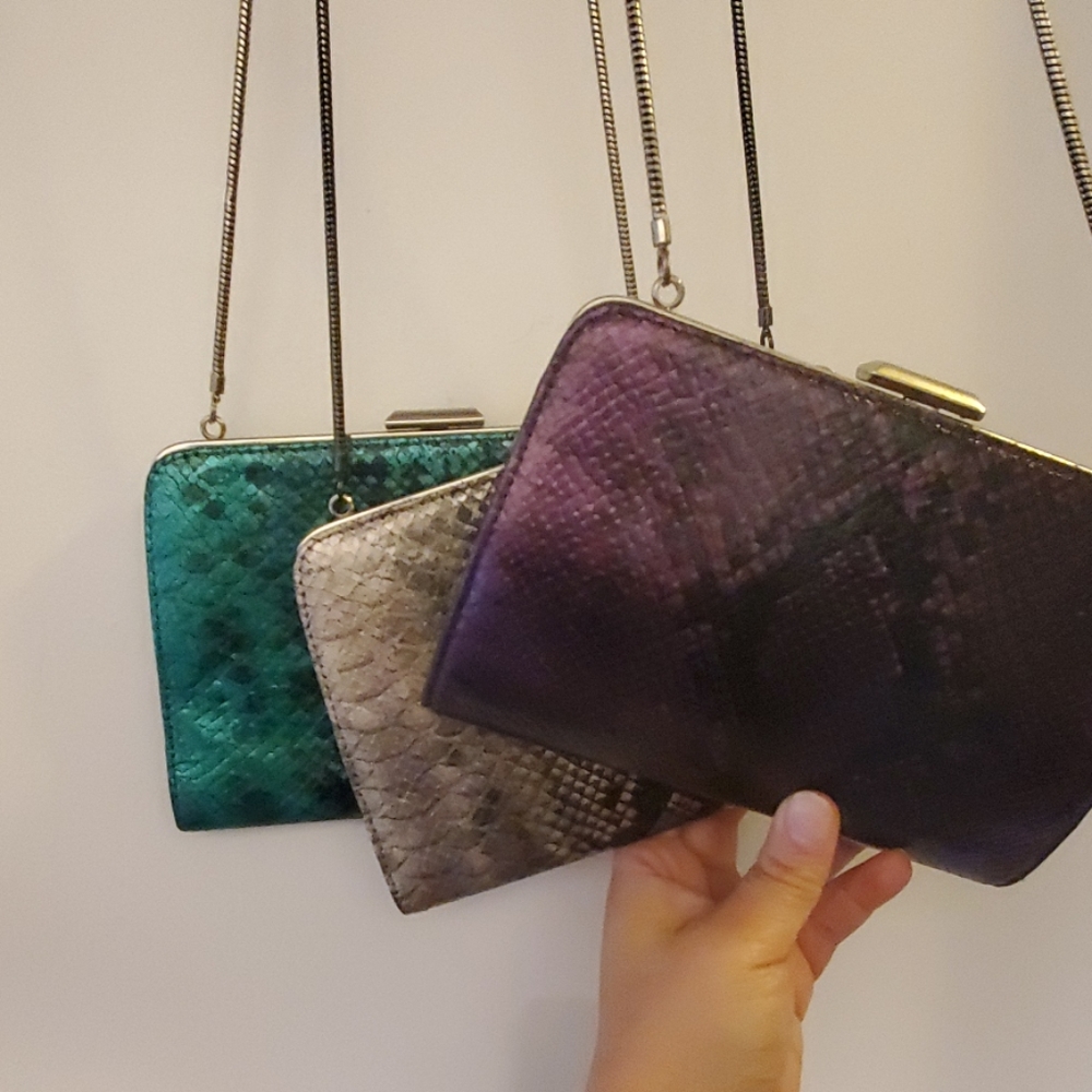 3 Beautiful snakeskin design crossbody handbags.